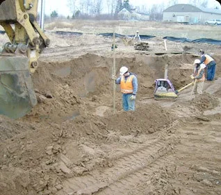 Powerbuilt Construction crew setting footings during a foundation excavation on a North Metro job site